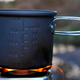 Illustration for article titled BioLite CampStove: Charges Your Phone and Warms Your Tush, By Burning Twigs